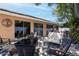 Stylish patio with outdoor seating and view of the rear exterior of the home at 8060 Canterbury Cir, Seminole, FL 33777
