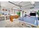 Spacious game room with ping pong table, foosball table, and ample storage at 8060 Canterbury Cir, Seminole, FL 33777