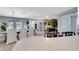 Open-concept kitchen with a view of the dining area and living spaces at 8060 Canterbury Cir, Seminole, FL 33777
