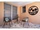 Cozy outdoor patio featuring seating, charming decor, and a serene, private ambiance at 8060 Canterbury Cir, Seminole, FL 33777