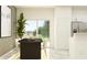Bright dining room featuring a modern table, chairs, and natural light at 9367 Cannon Beach Dr, Parrish, FL 34219