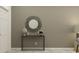 Stylish entryway with a decorative mirror, console table, and modern decor at 9367 Cannon Beach Dr, Parrish, FL 34219