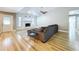 Spacious living room with a cozy fireplace, ample seating, and modern decor at 9580 130Th Ave, Largo, FL 33773
