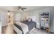 Well-lit bedroom features sleek ceiling fan, neutral-toned decor, and ample closet space at 9700 Starkey Rd # 312, Seminole, FL 33777