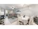 Open-concept living and dining area with comfortable seating and bright natural light at 9700 Starkey Rd # 312, Seminole, FL 33777