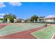 Well-maintained community tennis courts and shuffleboard area at 9700 Starkey Rd # 312, Seminole, FL 33777