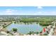A beautiful home with access to a serene and expansive lake, ideal for relaxing or recreation at 9721 Fredericksburg Rd, Tampa, FL 33635