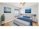 Beautiful bedroom with neutral walls, a ceiling fan and an abundance of natural light at 9721 Fredericksburg Rd, Tampa, FL 33635