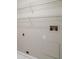 Utility closet includes wood shelving and access panel at 9721 Fredericksburg Rd, Tampa, FL 33635