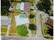 An aerial view of a neighborhood with a variety of homes, manicured lawns and mature trees at 1022 Greenbriar Dr, Brandon, FL 33511