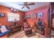 Comfortable bedroom featuring a built-in bookcase and unique decor at 1022 Greenbriar Dr, Brandon, FL 33511