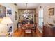 Cozy dining room with hardwood floors, chandelier, and natural lighting at 1022 Greenbriar Dr, Brandon, FL 33511