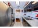 Well-lit kitchen with stainless steel appliances and a view to the dining area at 1022 Greenbriar Dr, Brandon, FL 33511