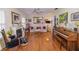 Inviting living room boasts hardwood floors, a fireplace, and a comfortable seating arrangement at 1022 Greenbriar Dr, Brandon, FL 33511