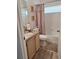 Functional bathroom with a granite-topped vanity, toilet, and shower-tub combination at 10908 Sailbrooke Dr, Riverview, FL 33579