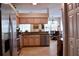 Well-equipped kitchen with stainless steel appliances, granite countertops, and tile flooring at 10908 Sailbrooke Dr, Riverview, FL 33579