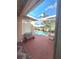 Relaxing covered patio overlooking a screened pool and expansive green space at 10908 Sailbrooke Dr, Riverview, FL 33579
