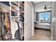 Bedroom featuring a walk-in closet with ample storage space, blending organization and style for a modern living experience at 1120 E Kennedy Blvd # 1512, Tampa, FL 33602