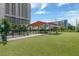 Community dog park area with modern seating and ample space for pets to run and play at 1120 E Kennedy Blvd # 1512, Tampa, FL 33602