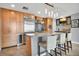 Gourmet kitchen with granite countertops, stainless steel appliances, and a center island with seating at 1120 E Kennedy Blvd # 1512, Tampa, FL 33602