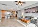 Open-concept living room and kitchen with modern décor and wood flooring at 1120 E Kennedy Blvd # 1512, Tampa, FL 33602