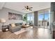 A modern living room featuring floor to ceiling windows with city views at 1120 E Kennedy Blvd # 1512, Tampa, FL 33602