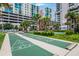 Shuffleboard court with Palm trees in a lush landscape creating the perfect backdrop for a friendly game at 1120 E Kennedy Blvd # 1512, Tampa, FL 33602