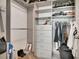 Walk-in closet with custom shelving and drawers, offering ample storage space and organization at 1120 E Kennedy Blvd # 1512, Tampa, FL 33602