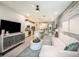 Open-concept living room and kitchen with contemporary furnishings and stylish decor at 1124 Creek Valley Ct, Brandon, FL 33511
