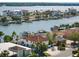 Beautiful neighborhood, waterfront views, private docks, and boats highlight this aerial landscape at 11285 8Th E St, Treasure Island, FL 33706