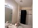 Bathroom featuring tub with shower at 11420 Bridge Pine Dr, Riverview, FL 33569