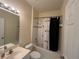 Well-maintained bathroom featuring a shower-tub combination and a single sink vanity at 11420 Bridge Pine Dr, Riverview, FL 33569