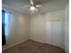Bedroom featuring a ceiling fan, neutral paint, and a built-in closet at 11420 Bridge Pine Dr, Riverview, FL 33569