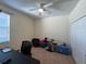 Spare bedroom featuring double closet, neutral walls and carpet flooring at 11420 Bridge Pine Dr, Riverview, FL 33569
