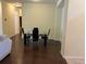 The dining room features hardwood floors and a glass table at 11420 Bridge Pine Dr, Riverview, FL 33569