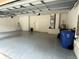 Clean and spacious two-car garage provides ample parking and storage space, along with a door to the house at 11420 Bridge Pine Dr, Riverview, FL 33569