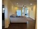 Spacious living area with hardwood floors, neutral walls, and stylish furnishings at 11420 Bridge Pine Dr, Riverview, FL 33569