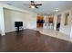 Spacious living room with open floor plan flowing into the kitchen and dining area at 11420 Bridge Pine Dr, Riverview, FL 33569
