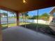 Enjoy outdoor living on this screened porch overlooking the fenced yard at 11420 Bridge Pine Dr, Riverview, FL 33569