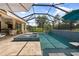 Beautiful pool and spa area with a screened enclosure, perfect for outdoor relaxation at 12672 Fontana Loop, Bradenton, FL 34211