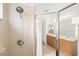 Bright bathroom shower with glass doors, tile surround and shower head at 12746 Standbridge Dr, Riverview, FL 33579