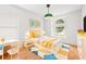 Bright and colorful bedroom featuring a bed, desk, and storage at 12746 Standbridge Dr, Riverview, FL 33579