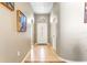 Bright foyer featuring tile flooring, neutral paint, and an arched transom window above the front door at 12746 Standbridge Dr, Riverview, FL 33579