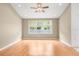 Spacious living room with hardwood floors, recessed lighting, and a large window offering natural light at 12746 Standbridge Dr, Riverview, FL 33579