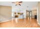Open living space showcases hardwood floors, recessed lighting, and seamless transitions to the kitchen and dining area at 12746 Standbridge Dr, Riverview, FL 33579