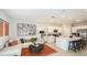 An open floor plan showcasing the living room, kitchen, dining, and eat-in seating areas at 13248 Stable Pl, Parrish, FL 34219