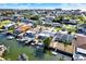 Aerial view of waterfront homes with boat docks and canal access at 13926 Darlene Ave, Hudson, FL 34667