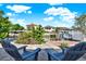 Backyard seating area featuring a canal view at 13926 Darlene Ave, Hudson, FL 34667