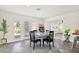 Cozy dining area complemented by sliding doors for seamless indoor-outdoor entertaining at 13926 Darlene Ave, Hudson, FL 34667