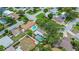 Stunning aerial view of a residential neighborhood with pools and well-maintained homes at 14321 113Th Ave, Largo, FL 33774